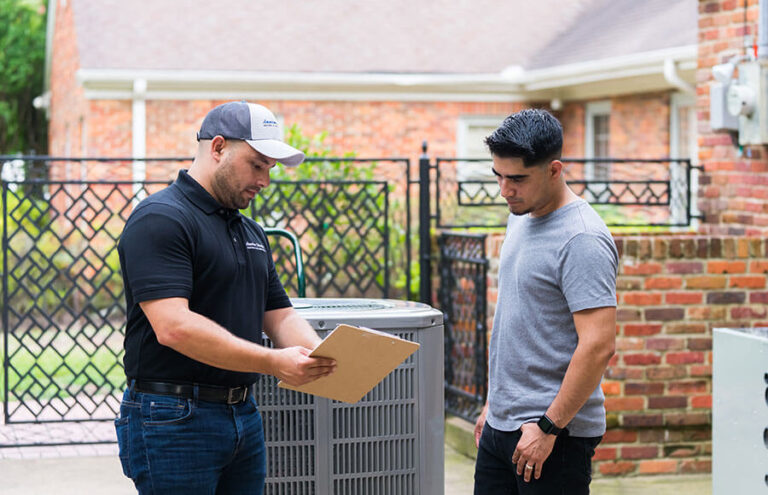 homeowner talking to american standard tech